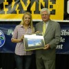 Jade Clemons accepts the PRIDE Volunteer of the Month Award from Congressman Hal Rogers