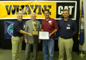 Steve Edge, Scott Moore and Robby Blair accept the City of London's PRIDE Spring Cleanup Award from Congressman Hal Rogers