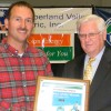 Kevin Houston accepted Hinkle Contracting Company’s PRIDE Volunteer of the Month Award from Congressman Hal Roger