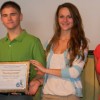 Zack Leftwich, Annette Dangerfield and Emily Green accepted Green County High School FBLA's PRIDE award from Tammie Wilson