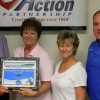 KCEOC staff accepted PRIDE Volunteer of the Month Award for August 2012