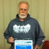 Larry Sawyers, president of the Holler Crawlers Off-Road Club, accepted the club’s PRIDE Volunteer of the Month Award.