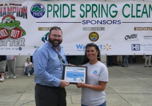 Bobby Clue accepted the PRIDE Volunteer of the Month Award from PRIDE’s Tammie Wilson.