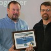 PRIDE's Mark Davis presented the Volunteer of the Month Award to Darren Sparkman, facilities director and energy manager for the Morgan County School District.