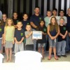 The Big Fork Church Youth Group accepted the PRIDE Volunteer of the Month Award for keeping their community clean.