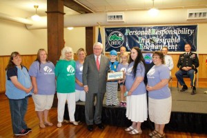 Congressman Hal Rogers presented the PRIDE Volunteer of the Month Award to the McCreary County Girl Scouts in appreciation for their dedication to local cleanup activities. Photo by the McCreary County Voice.