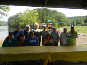 Members of the Red Bush Homemakers accepted the PRIDE Volunteer of the Month Award.